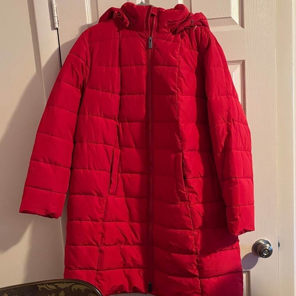 Woman Within Vibrant Red Puffer Jacket